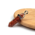 Hexagonal resin pendant with goldstone chips and silver metal clasp on wood base - Resin Goldstone