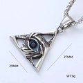 Macro shot of silver stainless steel triangle pendant necklace with Eye of Providence detail - Eye of Providence Triangle Style 9