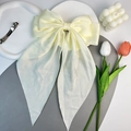 Elegant cream satin bow hair clip with long ribbons and metal spring fastener - Off White