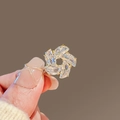 Elegant gold flower ring featuring clear faceted gemstones and a detailed textured band - 421# Petal