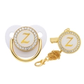 Close-up of white baby pacifier set with golden letter Z and sparkling rhinestone details - Letter Z