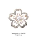 Close-up of gold flower brooch with white rhinestones and pearls, size 4.0cm x 4.1cm - Gold Floral Rhinestone Brooch (XD9139-1)