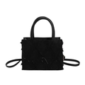 Minimalist black quilted crossbody bag with textured fabric finish and leather handle - Black