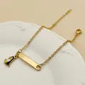 Bracelet chaîne plaqué or 18K avec pendentif pingouin en émail et plaque à graver - Manchot