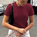 Stylish red knitted short sleeve t-shirt with crew neck for women on city street - S / Burgundy