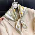 Elegant silk scarf with daisy pattern and green polka dot border styled on a suit - 92 Square Scarves / 65