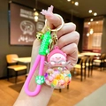 Porte-clés cochon rose avec boule transparente, perles et dragonne verte souple - Cochon Pêche Flocon de Neige Lumineux Coloré