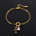 Prachtige goudkleurige roestvrijstalen armband met roze kristal en letter Z hanger - Letter N