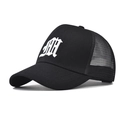 Close-up of gothic white letter A embroidery on a black mesh cotton trucker baseball cap - Black With White Letters