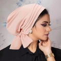 Close-up of pink velvet turban hat for women featuring a stylish side bow detail - Pink