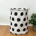 Large capacity canvas laundry basket featuring black polka dots and reinforced handles - Large Black Dots