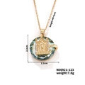 Golden religious pendant necklace featuring light green crystal and Guadalupe medallion - Pale Green Crystal Style (N00921-123)