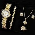 Detailed top view of gold-plated Roman numeral watch and rhinestone jewelry set - Gold Set