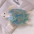 Detailed view of turtle hair claw clip with gradient blue-purple finish and shell texture - Large / Blue