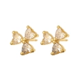 Elegant gold butterfly stud earrings with sparkling heart-shaped cubic zirconia stones - Bow