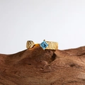 S925 silver adjustable ring in gold finish featuring a square blue gemstone and V-shaped band - Gold Natural Topaz
