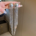 Elegant silver long tassel drop earrings with sparkling rhinestones held by hand - 90# Silver Earring Post-Silver-Tassel-Rhinestone Starry Effect