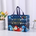 Blue Christmas non-woven gift bag with golden Merry Christmas text and Santa design - Christmas Snowman Blue
