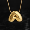 Polished golden stainless steel bubble letter A necklace pendant on dark marble surface - Gold (A) (Large)