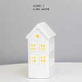 Macro detail of a white ceramic house LED light with hollow windows and 6.8x5.5x12cm size - RH2281 (6.8x5.5x12cm)
