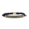 Macro detail of braided black rope bracelet with gold-plated metal green zircon stones - Gold Woven Green Zircon Curved Tube Bracelet