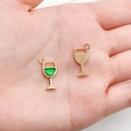 Golden and green enamel beer mug alloy charms held by hand to show actual scale - Green Enamel Wine Glass (9x18mm)