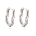 Irregular wavy hoop earrings in polished silver finish with secure clasp closure - Silver Wave