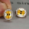 Elegant champagne gold earrings with oval yellow gemstone and white pavé accents - Rose Gold Plated Yellow Zircon