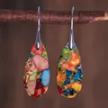 Detailed view of colorful teardrop stone earrings hanging on a natural wooden branch - Multi-color Patchwork Stone Texture Style (ER1025-6)