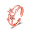 Rose gold adjustable ring featuring sparkling star motifs with inset crystals and metal finish - Rose Gold Star Style