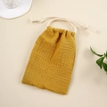 Detailed macro view of yellow double-layer muslin cotton drawstring storage bag - Ginger Yellow