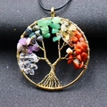Detailed close-up of handmade gold tree of life pendant with colorful natural chakra stones - Gold Circular Tree of Life