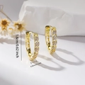 Detail view of gold hoop earrings with micro-set pink zircons and size measurements - Gold
