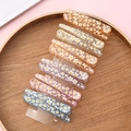 Set of 12 colorful resin daisy hair clips neatly arranged on a card in a wooden tray - 13# Large Floral Print
