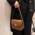 Minimalist brown leather crossbody bag with square gold buckle and adjustable strap - Brown