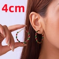 Aros de Navidad de 4cm en oro con espiral de esmalte rojo y verde usados por una modelo - 4cm / Espiral Rojo Verde Oro (Mediano)