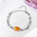 Pulsera de cadena de acero inoxidable con una cuenta de ágata naranja incrustada - Naranja