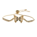 Adjustable copper butterfly bracelet with blue and white zircons on white background - Bead Box Chain