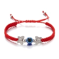 Handmade red braided evil eye bracelet with silver butterfly charms and adjustable cord - Butterfly / Red