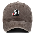Close-up of Grim Reaper embroidery on a vintage washed cotton baseball cap in dark brown - Coffee