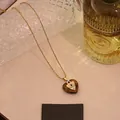 Collana con pendente a cuore in occhio di tigre e dettaglio malocchio in oro - 2#Pietra Occhio di Tigre