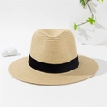 Detail of classic straw fedora with fine weaving and black ribbon on white background - Beige / M (56-58cm)