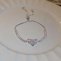Detail of silver heart-shaped zircon bracelet with adjustable slider clasp on white plate - Silver Heart Style (2#)