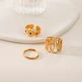 Three-piece set of elegant gold-plated titanium steel rings with hollow patterns - J627-Hollow Enamel Gold 3-Piece Set