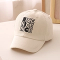Close-up of NICE letter embroidery and premium cotton twill texture on beige baseball cap - 52cm (Recommended 3-8 Years) / Beige