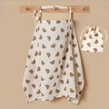 Detail of soft cotton muslin breastfeeding cover and storage bag with bear print - Bear