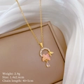Detailed macro view of gold-plated butterfly pendant with pearls and drop zircon - Pink Butterfly Pearl Micro Inlaid Pendant (D439)