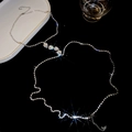 Detailed view of silver heart rhinestone body chain with shiny crystal embellishments - Silver-Heart Style