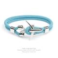 Detail of light blue woven bracelet featuring a silver aircraft charm on white background - Sky Blue Rope Silver Airplane