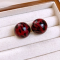 Close-up of red and black marble texture resin hoop earrings on a beige velvet tray - 43# Silver Earring Post - Red - Leopard Print